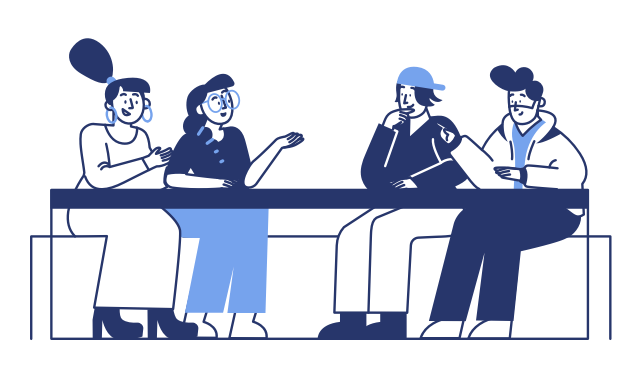 いろんな方がテーブルに座って英語で話している